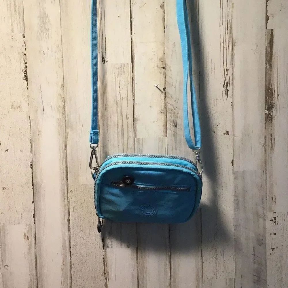 Purse crossbody Kipling style blue by Lacking One some fades shown